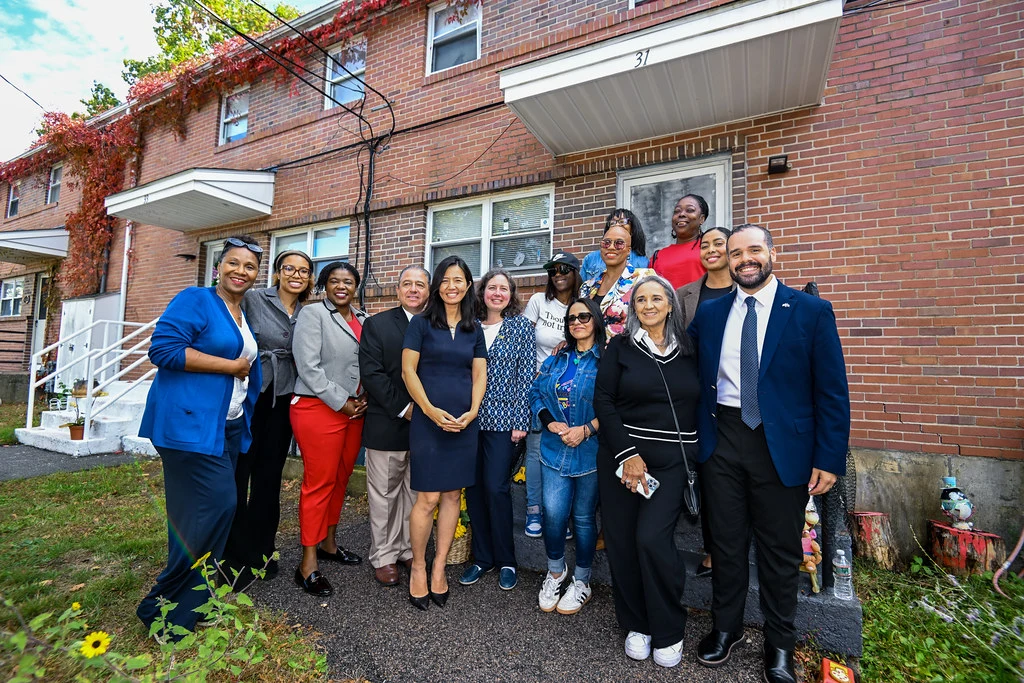 Participants at the Fairmount public-housing modernization announcement in Hyde Park on October 14, 2026.